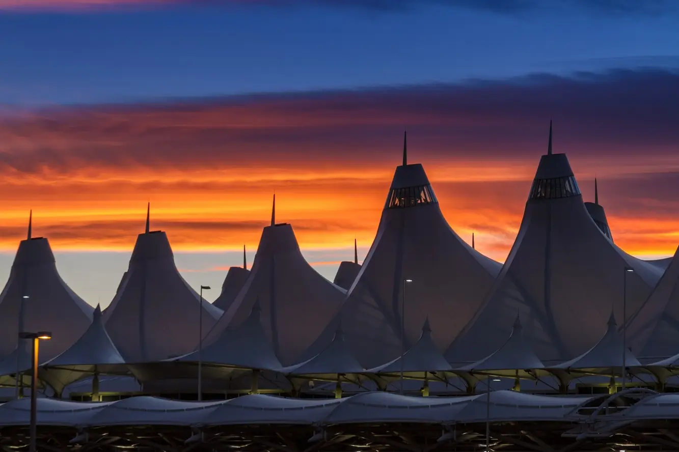 Beautiful sunset over DIA, being one of the many airport transportation facilities that Cirrus Transportations services.