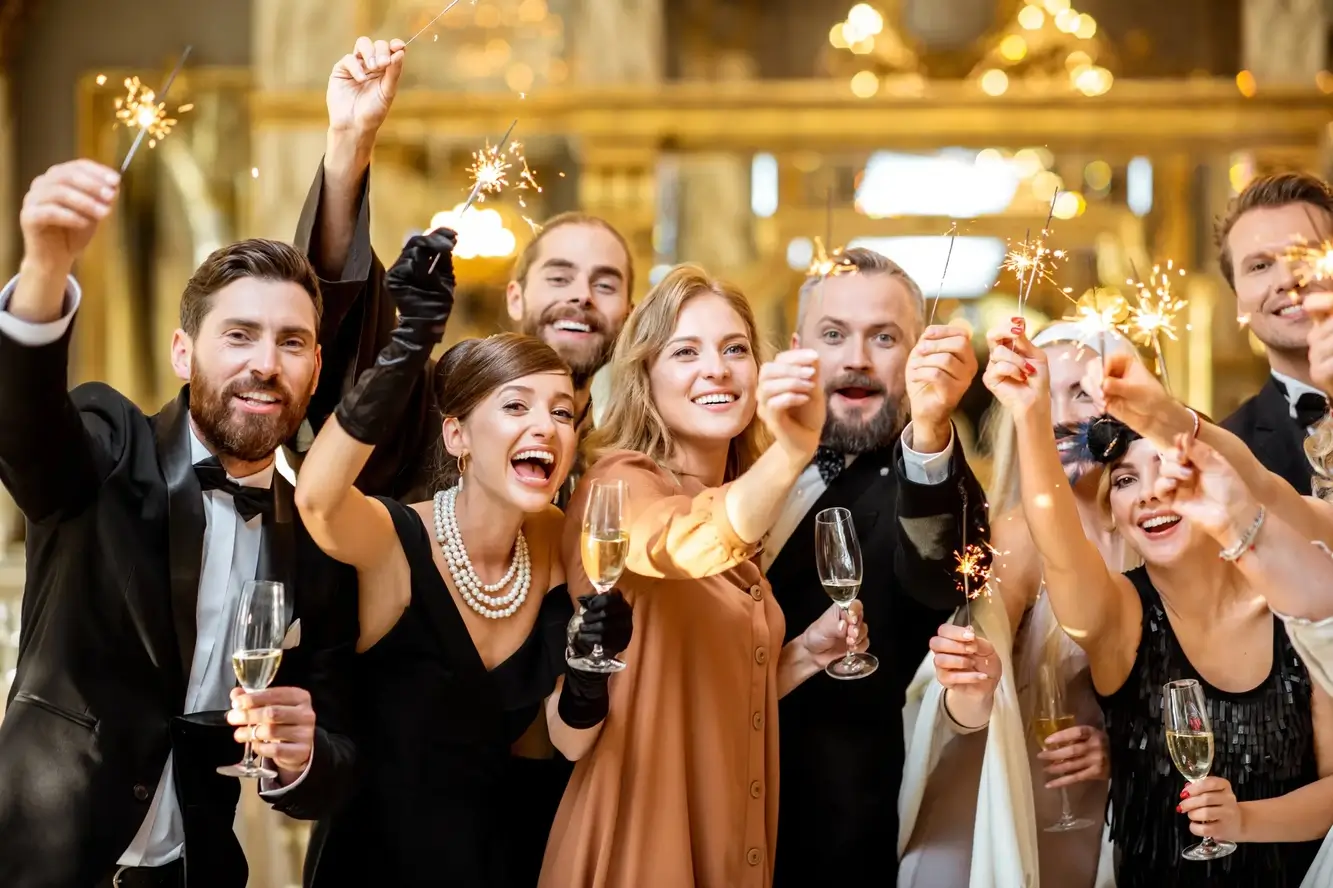 A crowd of people celebrating at their favorite Colorado venue as group events transportation becomes more and more popular.